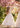 bride and flower girl dance