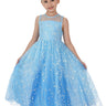 Young girl wearing a blue dress with star pattern on a white background