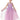 Young girl wearing a purple dress with star patterns on a white background