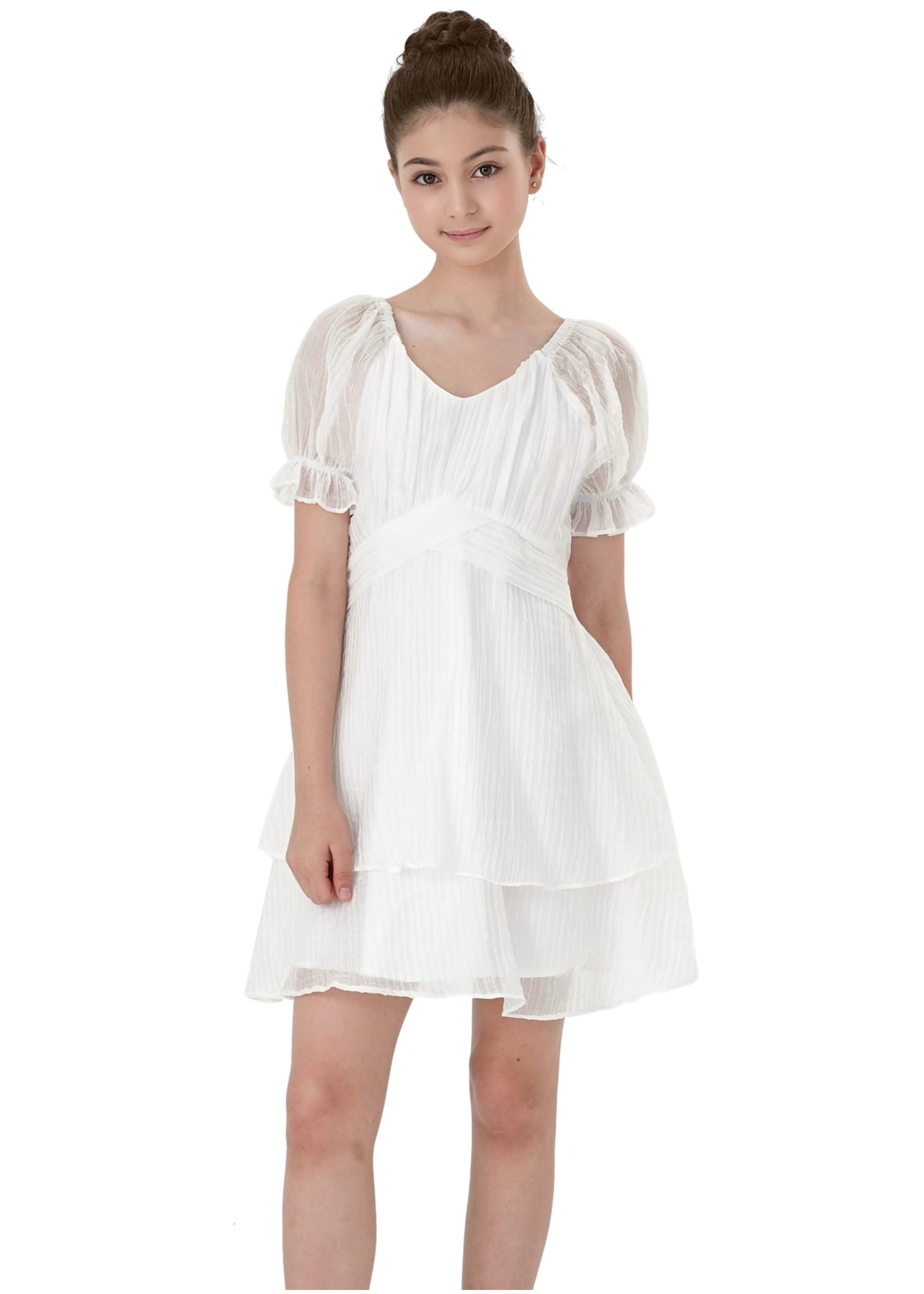 White dress worn by a model on a white background